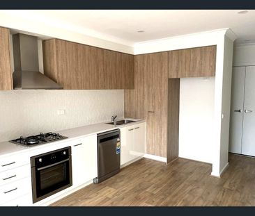 Stylish Two-Storey Living with Low-Maintenance Appeal - Photo 5