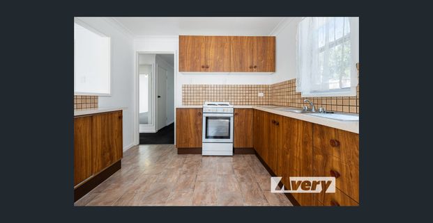 Low-Maintenance Living in Booragul - Photo 1