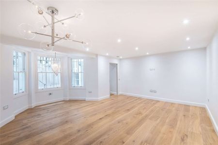 A recently refurbished two double bedroom and two bathroom apartment benefitting from a sleek and modern finish throughout and access to a private patio as well as its own private entrance - Photo 4