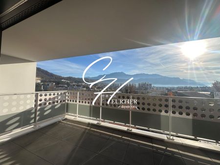 VOIRON – APPARTEMENT T3 TERRASSE + GARAGE ET PARKING - Photo 2