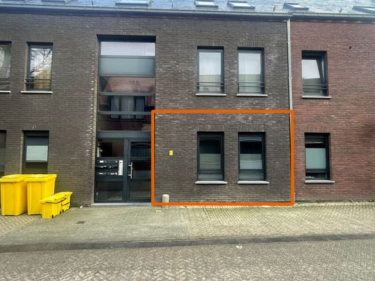 Gelijkvloers appartement met garagebox en tuin - Photo 1