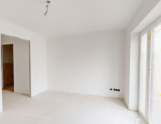 Neubau-Erstbezug in ruhiger Lage von Germering! Ideale 2-Zimmer-Gartenwohnung mit Top-Ausstattung! - Photo 1