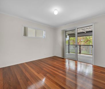 A charming home set on a generous block with a sprawling backyard. - Photo 6