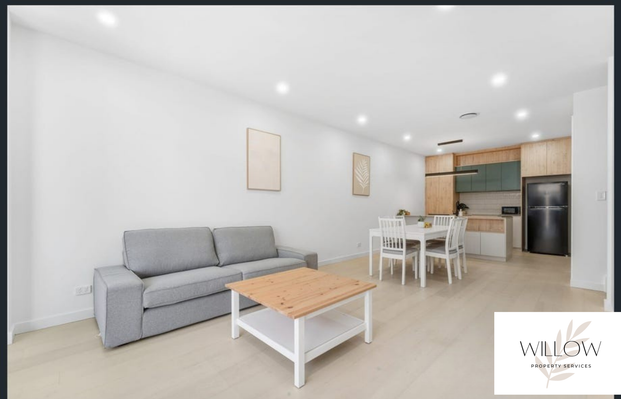 Executive Living at Its Finest – Fully Furnished Townhouse - Photo 1