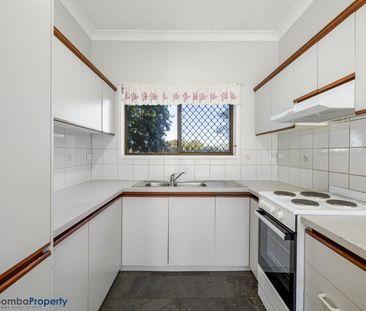 This impeccably presented brick townhouse is sure to impress! - Photo 3