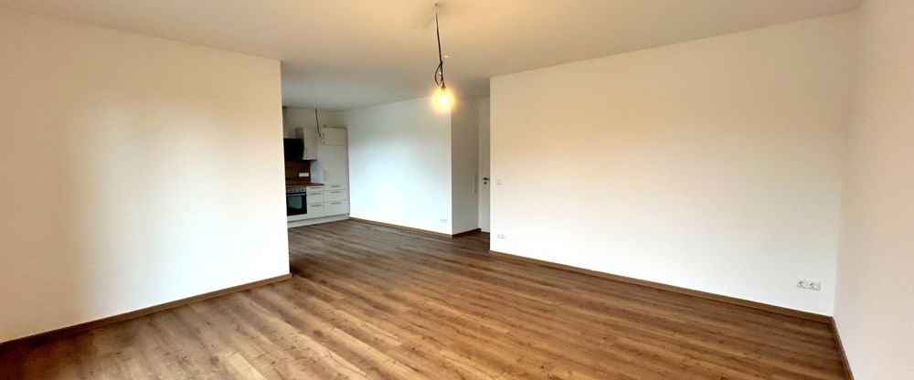 Augustfehn: Große Obergeschosswohnung mit Lift und Einbauküche | 91m² | KfW 40 - Foto 1