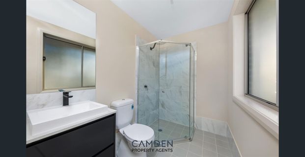 Charming and Spacious Home for Rent in the Heart of Austral's Thriving Community! - Photo 1