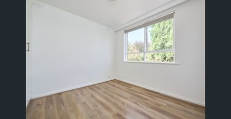 Stylish Renovated Apartment in Prime North Melbourne Location - Photo 4