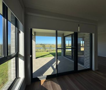 Executive Family Home with Sparkling Vista Views across Anambah Lagoon - Photo 1