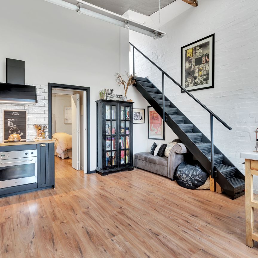 Versatile One Bedroom with Loft Studio and Courtyard - Photo 1