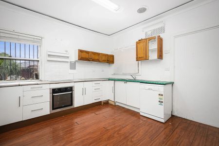 Spacious 3-Bedroom Brick Home on a Large Corner Block - Photo 2