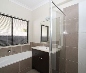 "Live in Comfort & Style - 4-Bedroom Rental with Air Conditioning & Fenced Yard!" - Photo 6