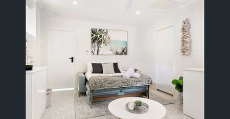 Kick back and relax in this calm, stylish space - Photo 3