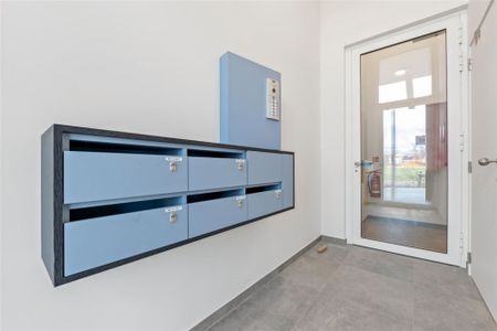 PRACHTIG NIEUWBOUW APPARTEMENT MET ONDERGRONDSE STAANPLAATS VLAKBIJ HET CENTRUM VAN SINT-TRUIDEN - Photo 3