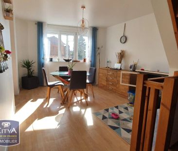 Appartement à louer 57.1m² - Photo 2