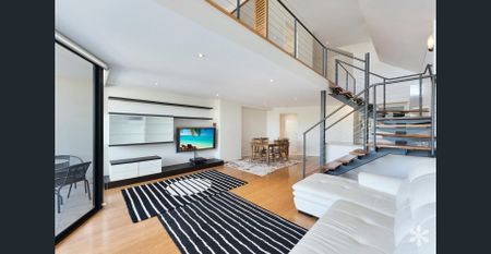 Sophisticated Apartment in Great Location - Photo 3