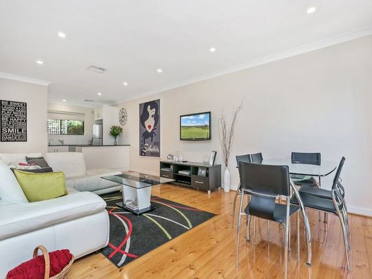 Stylish, Spacious, Two Bedroom Unit in a Quiet & Convenient Location - Photo 1