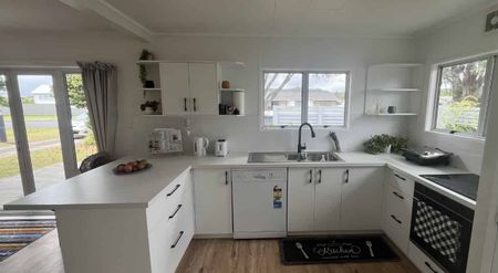 Fresh, Spacious & Ready for Summer Living! - Photo 2