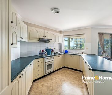 Top Floor Two-Bedroom Unit in Sought-After Location - Photo 3