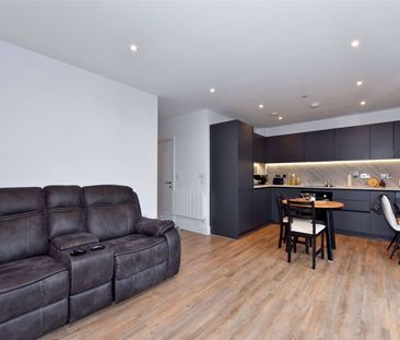 A modern apartment with south facing balcony offering far reaching ... - Photo 1