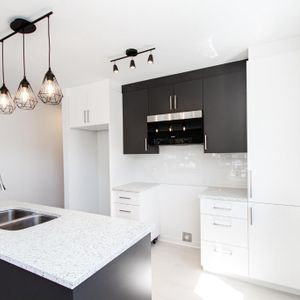 LOGEMENT 4 1/2 HAUT DE GAMME AVEC GARAGE - Photo 2