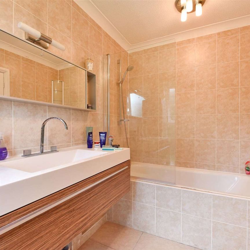 A spacious two bedroom apartment with off-street parking and garage in a peaceful setting. - Photo 1