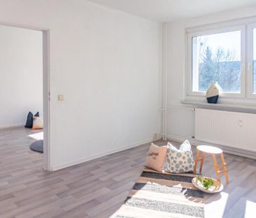 Modernisierte Erdgeschosswohnung mit Balkon - Foto 1