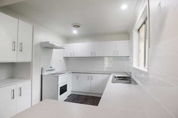 Great family home in a convenient location - Photo 1
