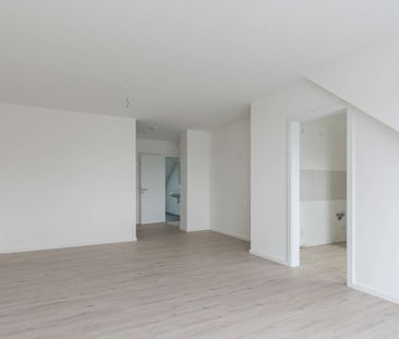 Neubau! Helle 3-Zimmer Dachgeschosswohnung mit tollem Balkon in Ras... - Foto 2