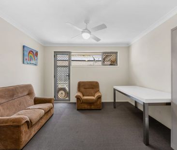 Comfortable and Convenient 4-Bedroom Family Home - Photo 1