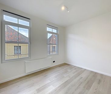Gerenoveerde woning met 3 SLPKS en stadsterras te Gent - Foto 1