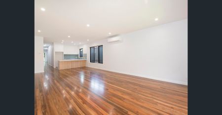 Spacious, Stylish Living in a Prime Location! - Photo 2