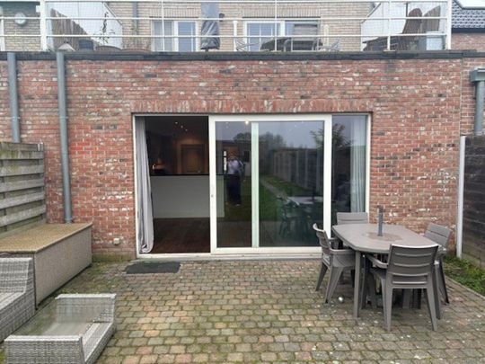 Gelijkvloers appartement met tuin en garage! - Photo 1