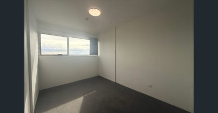 Two Bedroom Penthouse Unit with AC! - Photo 2