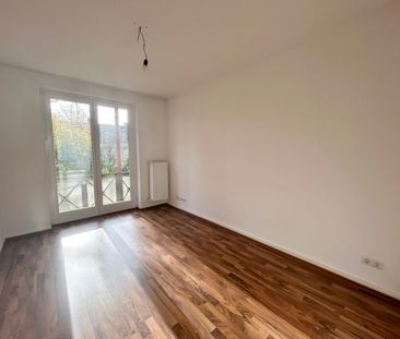 Schöne Etagenwohnung mit Balkon - Foto 1
