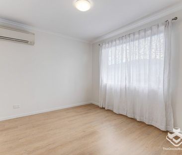 Modern 3-Bedroom Parkside Townhouse in Sought-After Complex - Photo 4