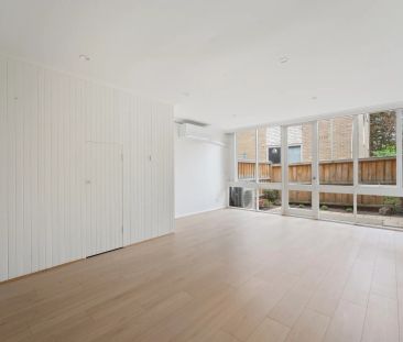 Sun-Filled Modern Townhouse with Stone Kitchen and Private Courtyar... - Photo 1