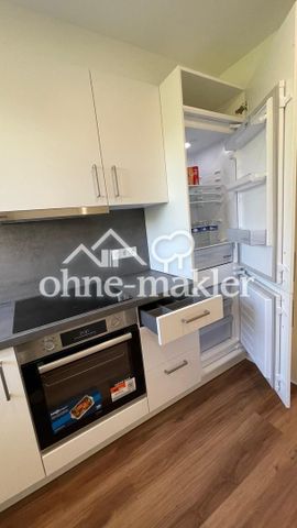 Design trifft Komfort: Hochwertige EG-Wohnung mit Terasse, Stellplatz & Einbauküche - Foto 5