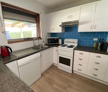 LOVELY AND IMMACULATE 3 BR FAMILY HOME WITH EXTRA SHEDDING - Photo 1