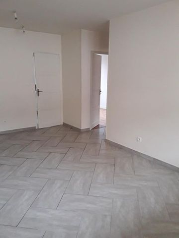 Location Appartement 3 pièces 56m² - Photo 4