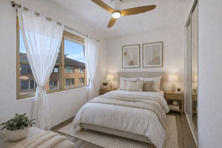 Top-Floor Coastal Living in the Heart of Cronulla - Photo 3