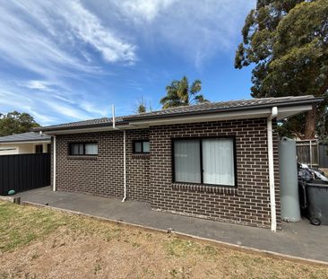 Cozy 2-Bedroom Home with Modern Finishes - Photo 6