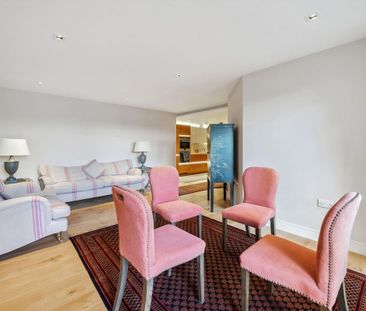 A beautifully presented two-bedroom apartment with private balcony, secure parking and superb resident amenities, set within the sought-after Strand House development. - Photo 1