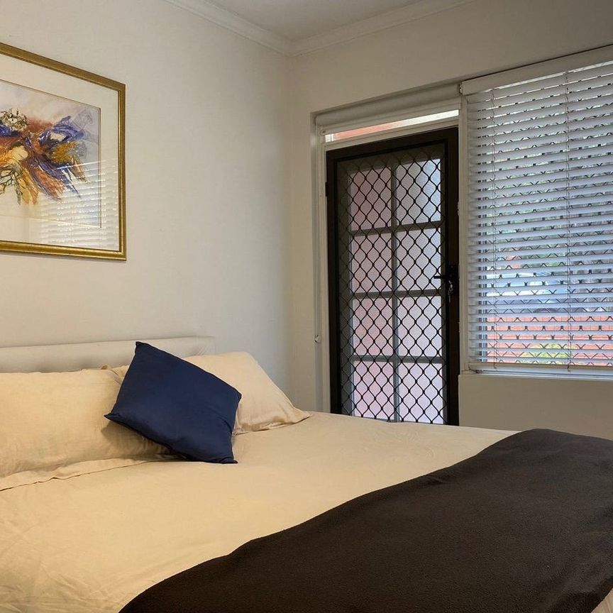 GROUND FLOOR UNIT IN CONVENIENT LOCATION - Photo 1