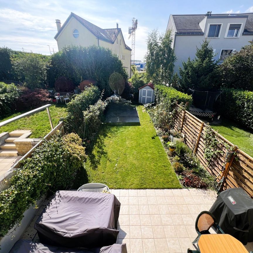 Villa mitoyenne de 5,5 pièces avec terrasse et jardin - Photo 1