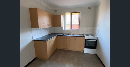 Convenient & Centrally Located Unit - Photo 2