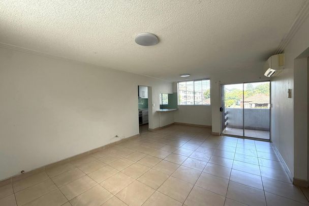 ELEVATED UNIT IN A CENTRAL LOCATION - Photo 1