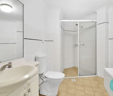 MODERN 2-BEDROOM GROUND FLOOR UNIT WITH SPACIOUS ENTERTAINER'S BALCONY - Photo 4