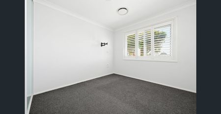 Renovated Coastal Family Home with Huge Pool and Generous Living - Photo 5