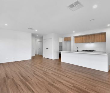 Quality Four-Bedroom Home with Low-Maintenance Living - Photo 2